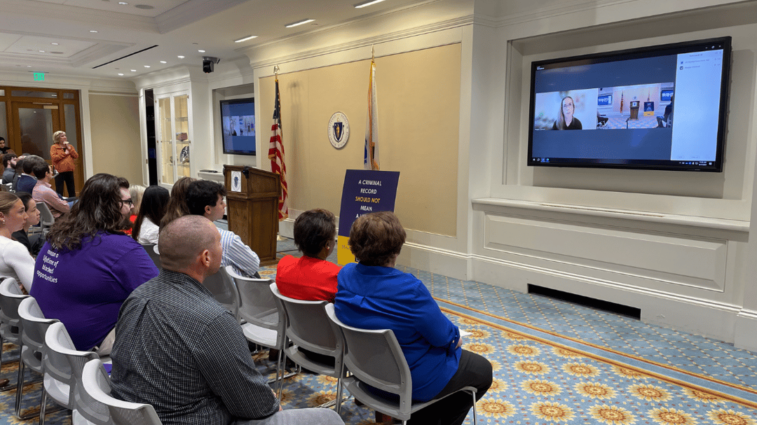 Maggie O'Donnell speaking at the MA Criminal Justice Reform Caucus