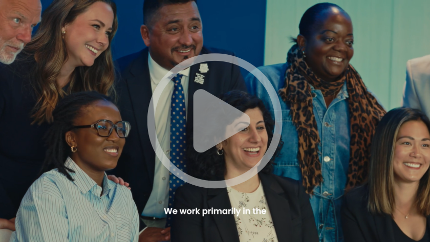 Smiling speakers and attendees at the 2026 Workforce & Justice Summit